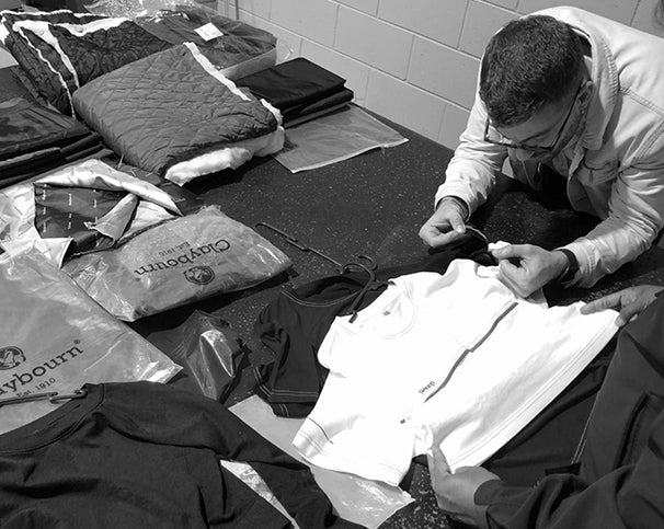 A man checking the clothes