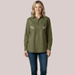 Model wearing an army green long-sleeve customizable maternity and nursing shirt with a concealed quarter-button placket and two custom floral-pattern embroidered chest patches.