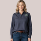 Woman wearing a navy blue long-sleeve customizable maternity and nursing work shirt with a quarter-placket, dual chest pockets, and custom Australian native embroidery.